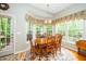 Cozy dining area filled with natural light, perfect for Gathering meals at 437 New Parkside Dr, Chapel Hill, NC 27516