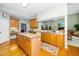 Spacious kitchen with a center island, wood cabinets, and ample counter space at 437 New Parkside Dr, Chapel Hill, NC 27516