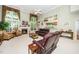 Open-concept living room features a fireplace and seamless flow to the kitchen at 437 New Parkside Dr, Chapel Hill, NC 27516