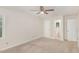 Bedroom with neutral paint, carpet, ceiling fan, and an attached bathroom at 4621 Worthington Ln, Raleigh, NC 27604