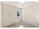This bedroom features neutral walls, carpet, and a window at 4621 Worthington Ln, Raleigh, NC 27604