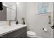 This clean bathroom is finished with subway tile in the shower and gold hardware at 5117 Dove Forest Ln, Apex, NC 27539