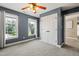 This bedroom has two large windows that let in lots of light and provide a nice view at 5117 Dove Forest Ln, Apex, NC 27539