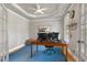 Bright office space with a tray ceiling, French doors, and a comfortable workspace at 5117 Dove Forest Ln, Apex, NC 27539