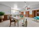 Bright bonus room features wood-paneled walls, carpeted floors, and a ceiling fan at 515 Tramway West Rd, Sanford, NC 27330