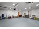 Large garage features bright lighting, painted floors, and ample storage space at 515 Tramway West Rd, Sanford, NC 27330