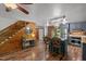 Open kitchen with hardwood floors, stainless steel appliances, and a charming chandelier at 515 Tramway West Rd, Sanford, NC 27330
