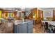 Spacious kitchen with island, hardwood floors, and open access to living spaces at 515 Tramway West Rd, Sanford, NC 27330