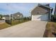 Long driveway to detached garage at 5200 Beckom St, Raleigh, NC 27616