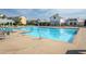 Large community pool with clear blue water, accessible steps, and plenty of seating, ideal for community enjoyment at 5200 Beckom St, Raleigh, NC 27616
