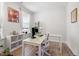 Bright office space with a glass desk, shelving, and natural light at 521 Marion Hills Way, Knightdale, NC 27545