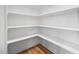 Well-organized walk-in pantry with ample shelving and storage space at 521 Marion Hills Way, Knightdale, NC 27545