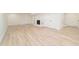 Spacious basement featuring a fireplace and new light-colored flooring throughout at 529 Orindo Dr, Durham, NC 27713