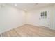 Basement area with a white door providing access to the outside at 529 Orindo Dr, Durham, NC 27713