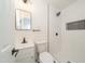 Modern bathroom features a sleek vanity, toilet, and tiled walk-in shower at 529 Orindo Dr, Durham, NC 27713