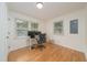 Bright office space with large windows offering natural light and hardwood floors at 529 Orindo Dr, Durham, NC 27713