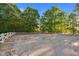 Equestrian area with white fence and beautiful trees at 54 Malcolm Neal Path, Louisburg, NC 27549