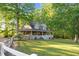 Beautiful two-story home with wrap-around porch and large front yard at 54 Malcolm Neal Path, Louisburg, NC 27549
