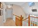 Upstairs hallway with natural light and skylight at 54 Malcolm Neal Path, Louisburg, NC 27549
