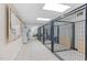 Indoor kennel area featuring multiple dog runs and a dedicated grooming station at 54 Malcolm Neal Path, Louisburg, NC 27549