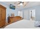 Spacious bedroom, adjacent to bathroom, with calming paint color and ceiling fan at 54 Malcolm Neal Path, Louisburg, NC 27549