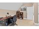 Home office featuring a desk, bookcase, and neutral carpet at 54 Malcolm Neal Path, Louisburg, NC 27549