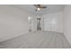 Spacious bedroom featuring a ceiling fan, plush carpeting, and ample natural light at 604 Oakfield Trl, Mebane, NC 27302