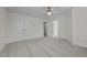 Spacious bedroom featuring neutral carpet, a ceiling fan, and a double-door closet at 604 Oakfield Trl, Mebane, NC 27302