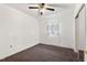 Cozy bedroom with a ceiling fan and closet provides a comfortable retreat at 620 Mcghees Mill Rd, Roxboro, NC 27574