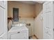 Laundry room with a dryer and shelving space at 620 Mcghees Mill Rd, Roxboro, NC 27574