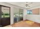 View of the sunroom showcasing sliding glass door and view of the outdoor space at 620 Mcghees Mill Rd, Roxboro, NC 27574