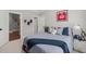 This bedroom boasts a sport theme, great natural light, and en suite bath access at 6208 Old Miravalle Ct, Raleigh, NC 27614
