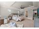 Inviting bedroom offering ample space, neutral tones, and a view of the backyard at 6208 Old Miravalle Ct, Raleigh, NC 27614