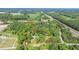 Aerial view of wooded lot with approximate boundary lines and nearby highway access at 726 Thomas Rd, Rocky Mount, NC 27801