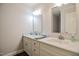Well-lit bathroom featuring a double vanity with white cabinets and bright mirrors at 726 Thomas Rd, Rocky Mount, NC 27801