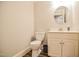 Clean, well-lit bathroom features a modern toilet, vanity, and neutral tones for a refreshing feel at 726 Thomas Rd, Rocky Mount, NC 27801