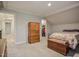 Bedroom showcasing carpet floors, a dresser, and a walk-in closet at 726 Thomas Rd, Rocky Mount, NC 27801