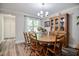 Traditional dining room showcasing a wooden table, chairs, and a china cabinet at 726 Thomas Rd, Rocky Mount, NC 27801