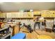 Spacious workshop featuring a workbench area with ample storage and built in cabinets at 726 Thomas Rd, Rocky Mount, NC 27801