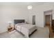 Inviting bedroom with plush carpet, neutral tones, and a serene atmosphere, perfect for relaxation at 7611 Satinwing Ln, Raleigh, NC 27617