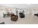Spacious living room with dining area, kitchen, and modern furniture at 823 Biltmore Dr, Sanford, NC 27332