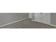 Bedroom featuring gray walls, gray carpet, and white trim at 900 Finchurch Cir, Wake Forest, NC 27587