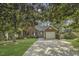 Lovely brick home featuring a well-maintained lawn and inviting front entrance, showcasing suburban charm at 900 Finchurch Cir, Wake Forest, NC 27587