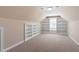 The finished attic with built-in white bookcases is perfect for use as a home office at 97 Rand Rd, Raleigh, NC 27603