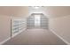 Finished attic with built-in white bookcases and neutral walls, perfect for flexible living space at 97 Rand Rd, Raleigh, NC 27603