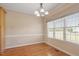 Cozy dining area with hardwood floors and large windows offering ample natural light at 97 Rand Rd, Raleigh, NC 27603