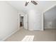 Bedroom adjacent to a bathroom and attic storage at 9701 Precious Stone Dr, Wake Forest, NC 27587