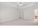 Spacious bedroom showcasing a tray ceiling and adjoining bathroom at 9701 Precious Stone Dr, Wake Forest, NC 27587