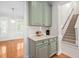Butler's pantry located near the kitchen with cabinets and countertops at 9701 Precious Stone Dr, Wake Forest, NC 27587