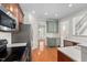 Modern kitchen features stainless appliances and an adjacent butler's pantry at 9701 Precious Stone Dr, Wake Forest, NC 27587